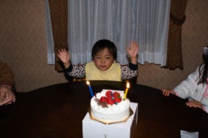 boy with his birthday cake