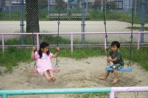 kids on a swing